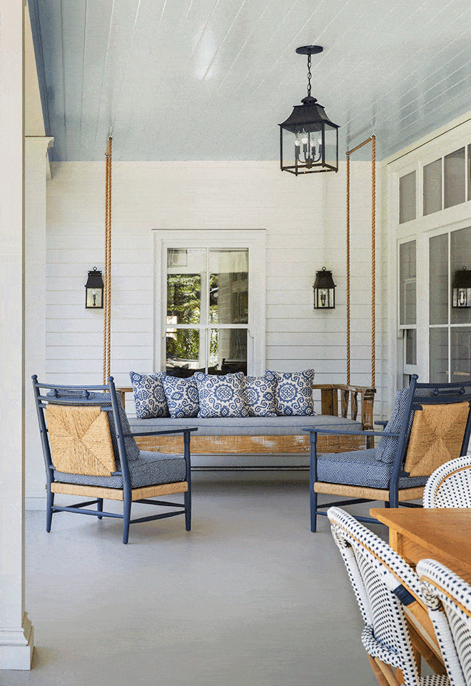porch with bed swing and rocking chairs