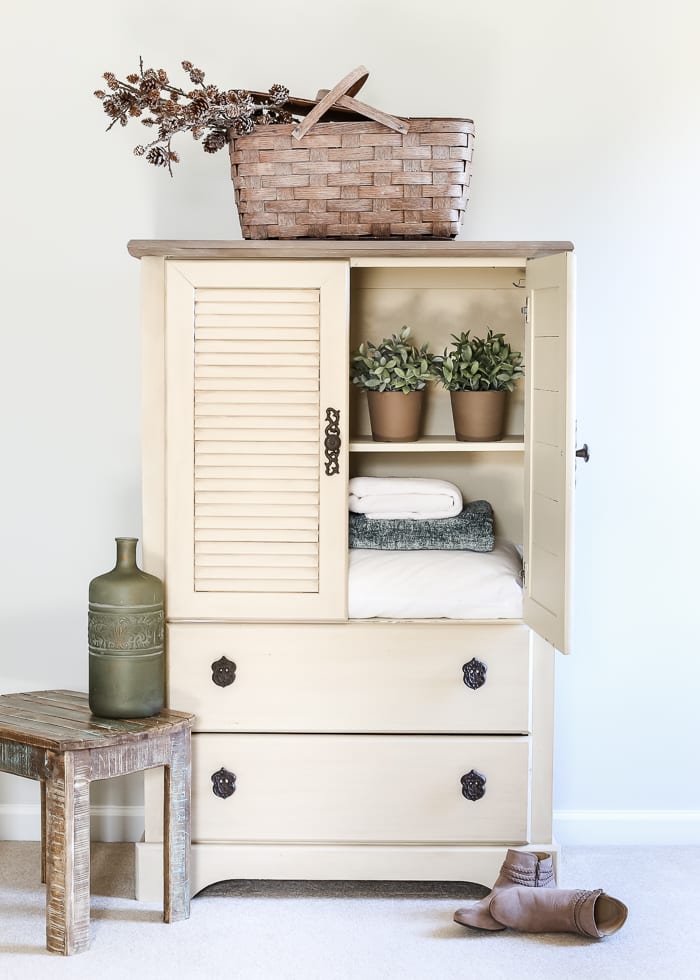 Faux Antique Shutter Armoire Makeover | blesserhouse.com - A basic veneer cabinet gets a faux antique makeover using Fusion Mineral Paint in the color Plaster aged with Espresso wax and cast iron hardware. 