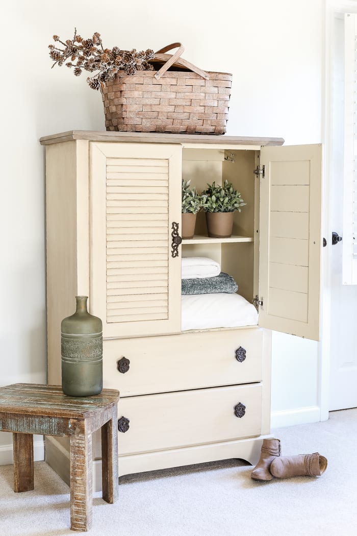 Faux Antique Shutter Armoire Makeover | blesserhouse.com - A basic veneer cabinet gets a faux antique makeover using Fusion Mineral Paint in the color Plaster aged with Espresso wax and cast iron hardware. 