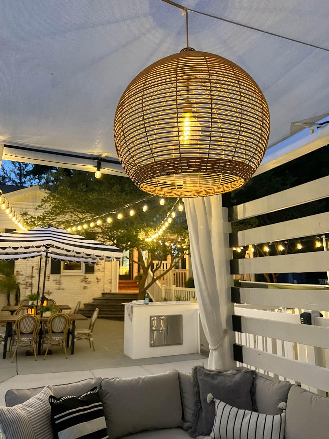 solar pendant light in outdoor dining area