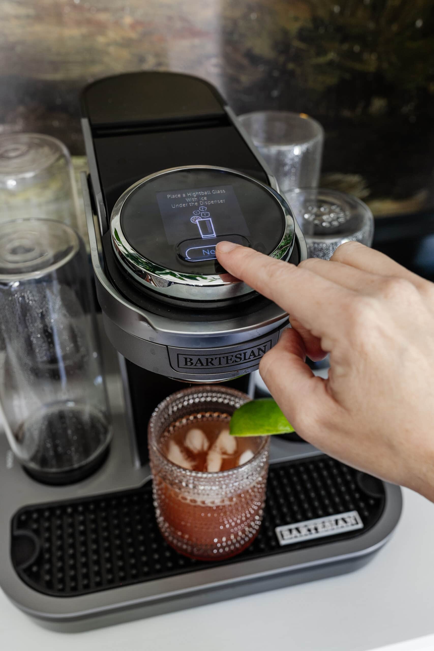 bartesian machine touch screen button to make a drink