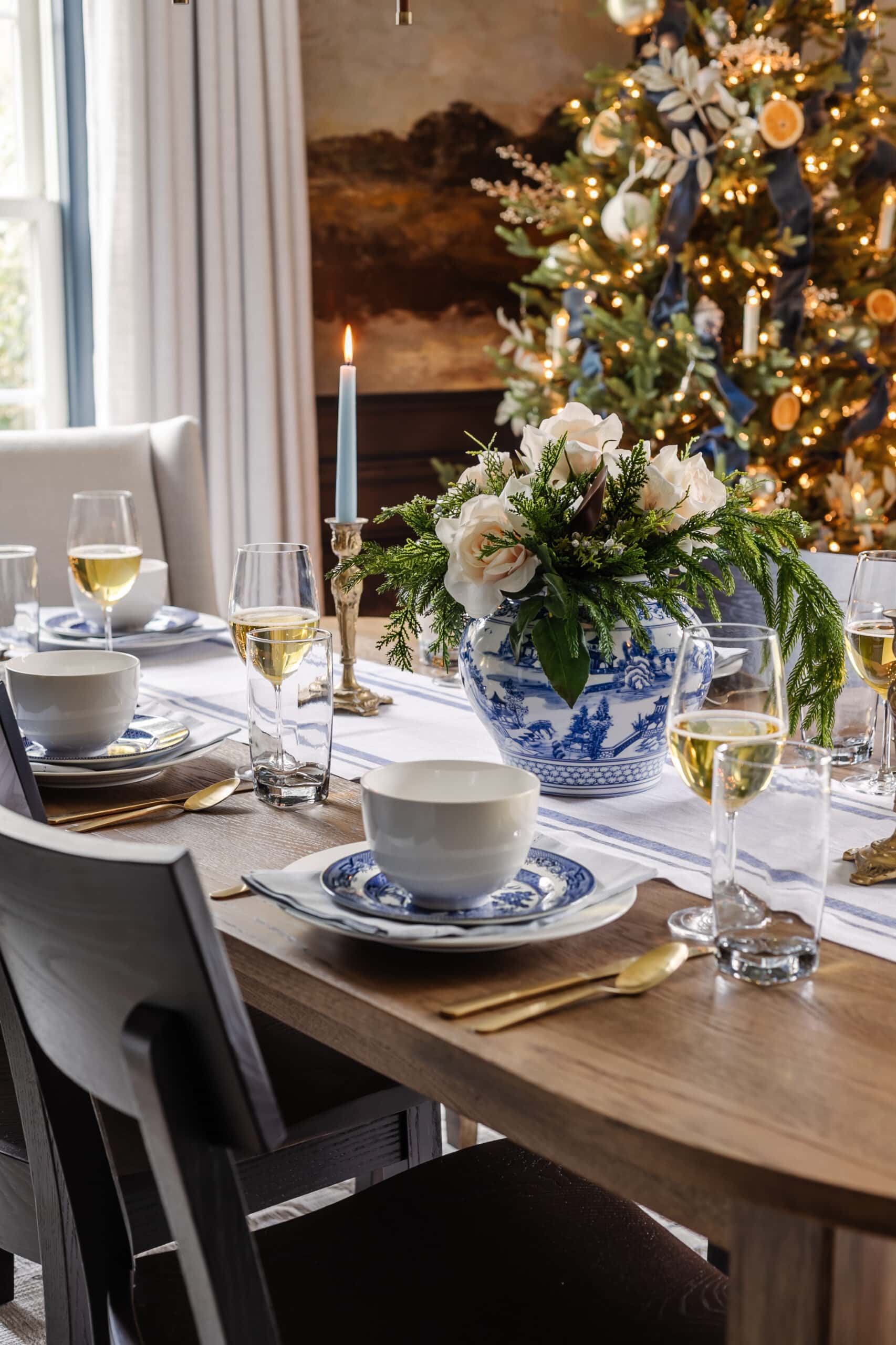 Christmas dining table decorated with vintage blue and white dishes