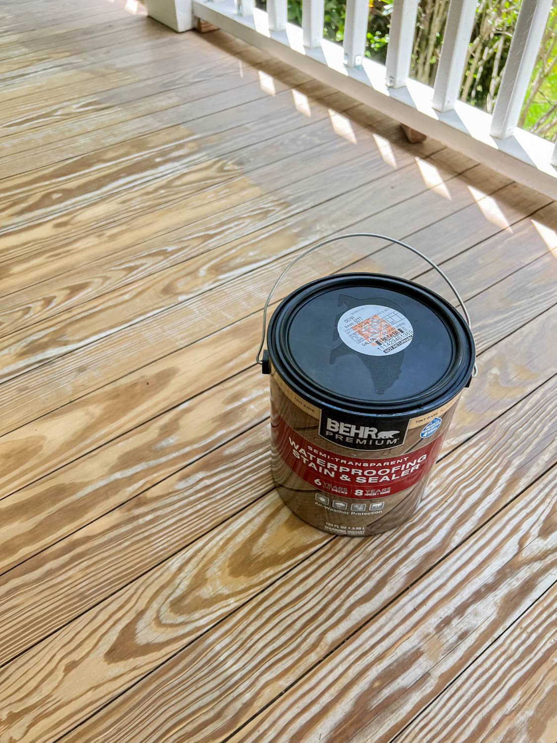 Behr Semi-Transparent Waterproofing Stain and Sealer in Taupe on old wood deck