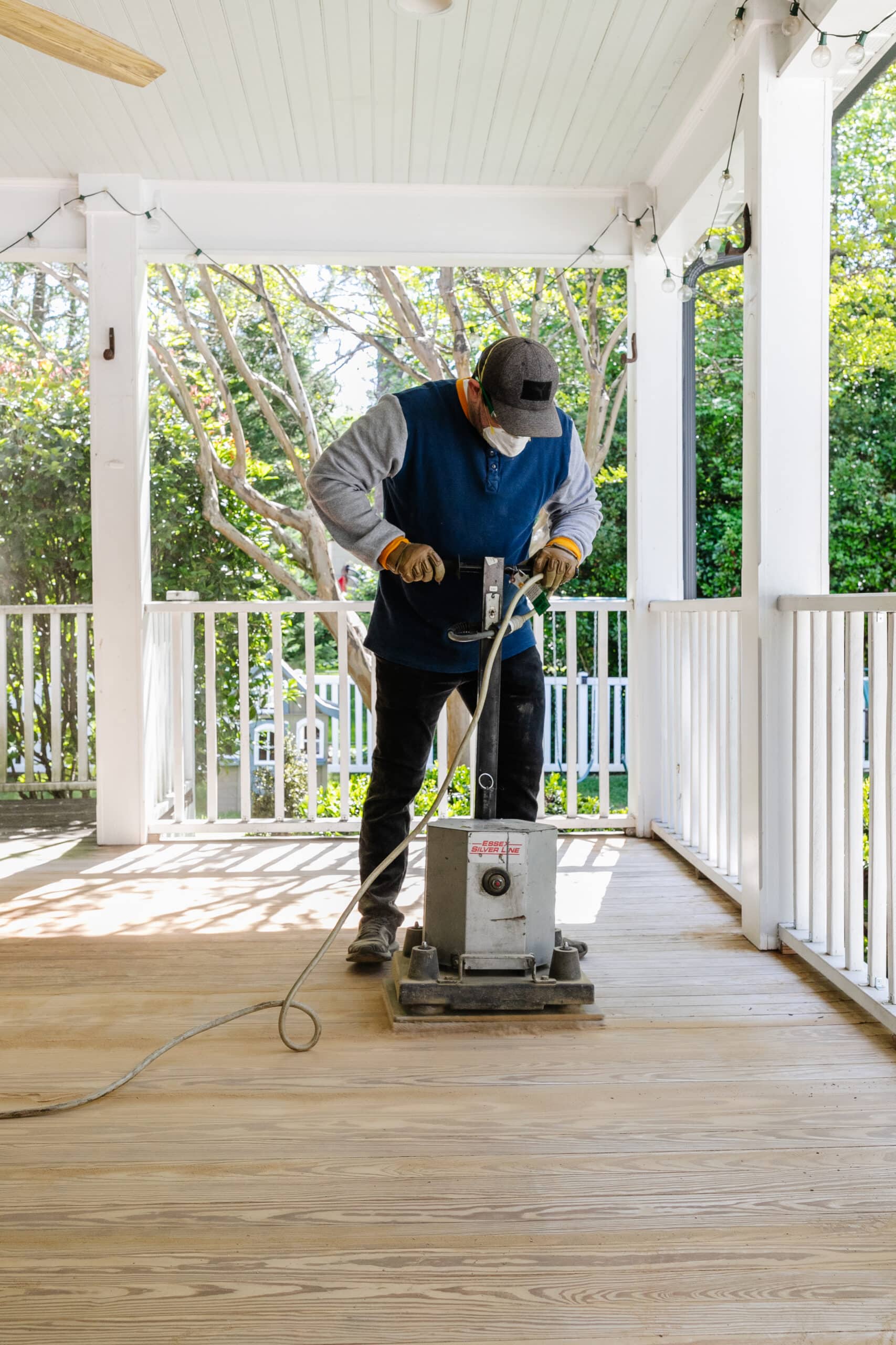 refinishing a wood deck with a floor sander