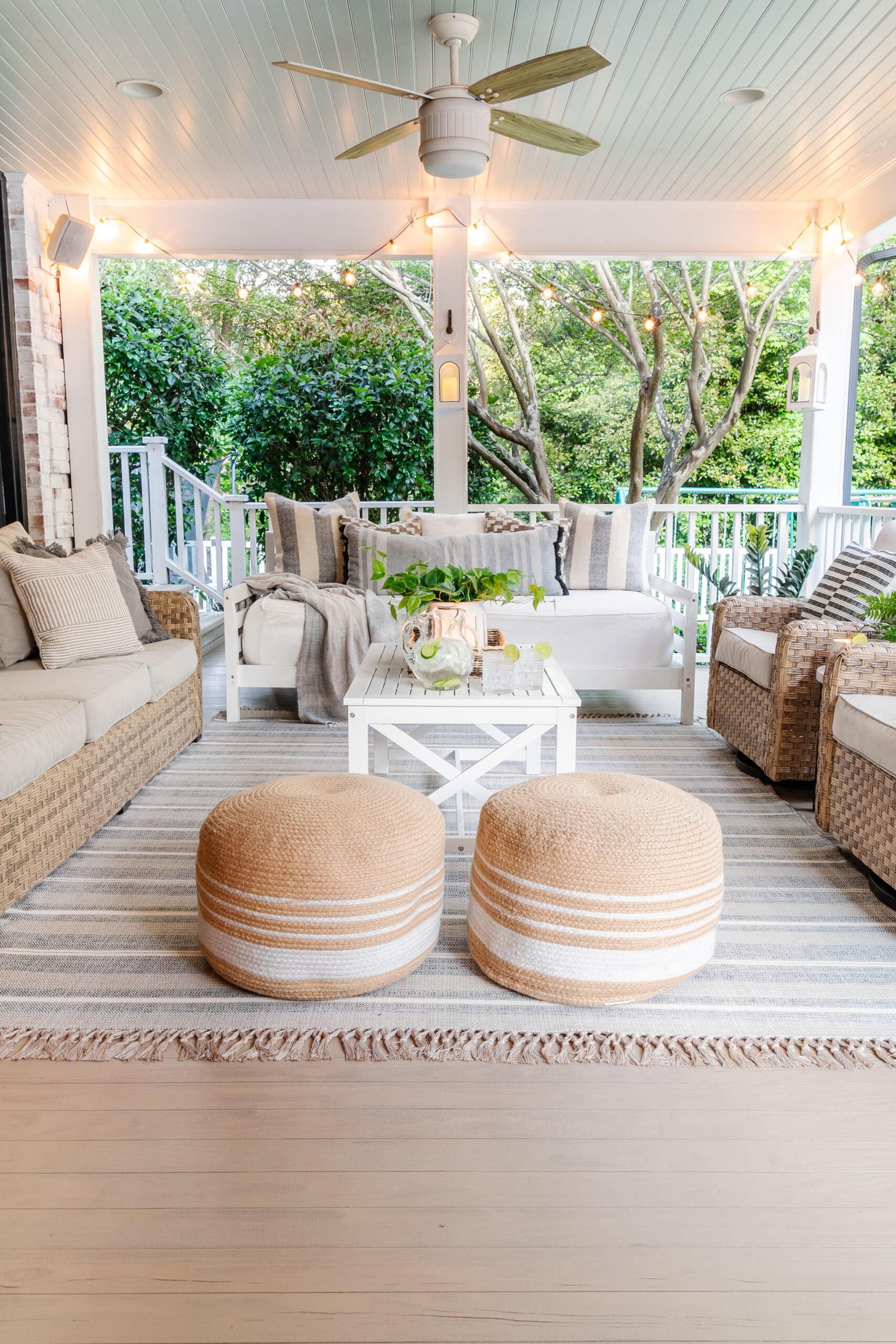 back porch floor refinished with Behr Stain in Taupe + back porch furniture and decor from Walmart