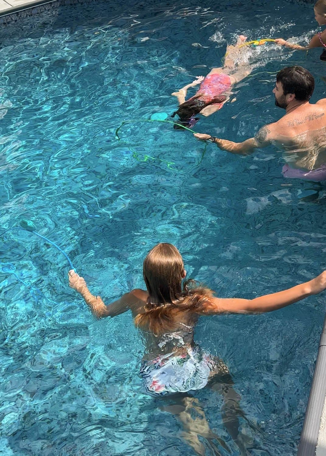 swim-through rings for pool party game idea