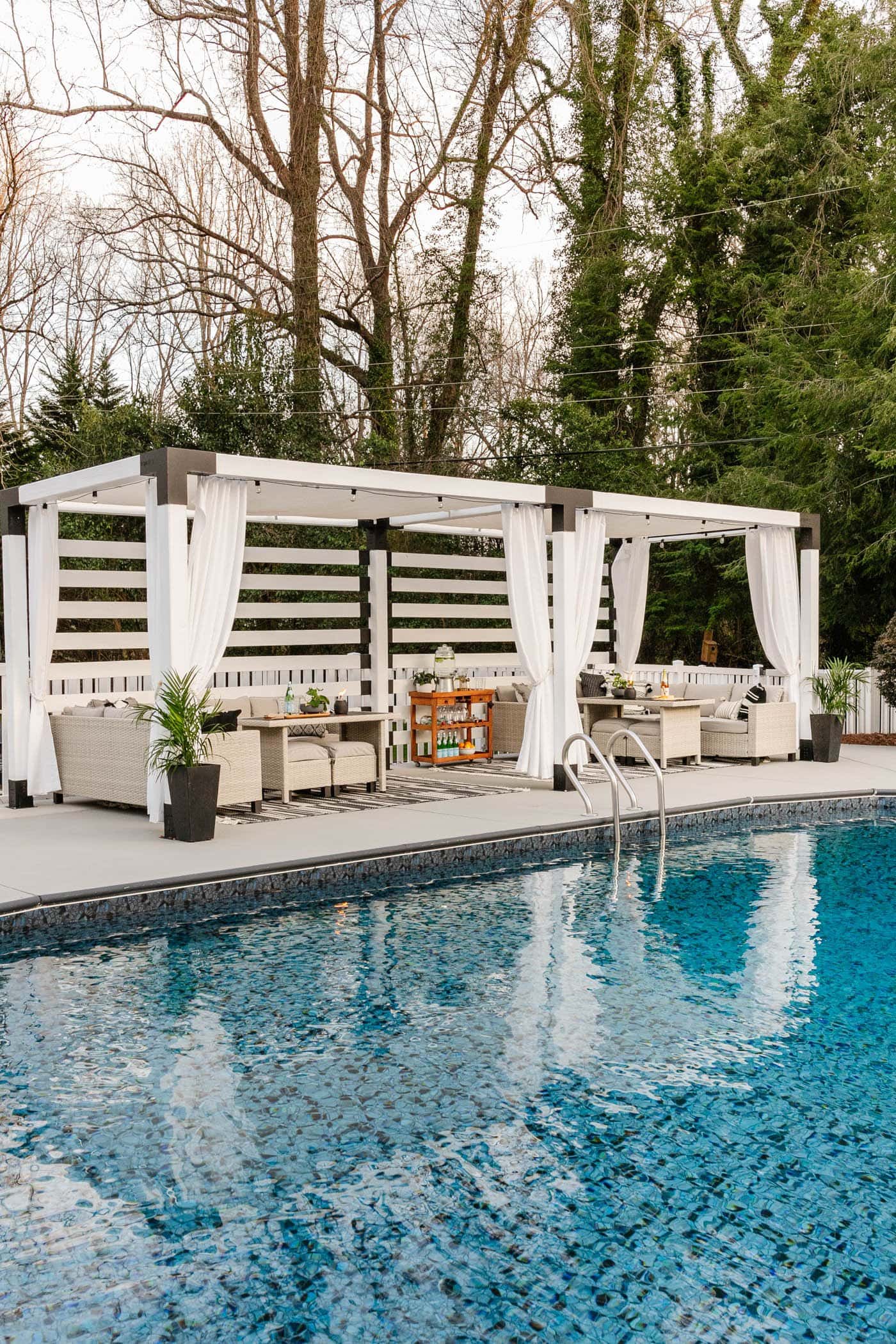 poolside cabana pergola in a backyard