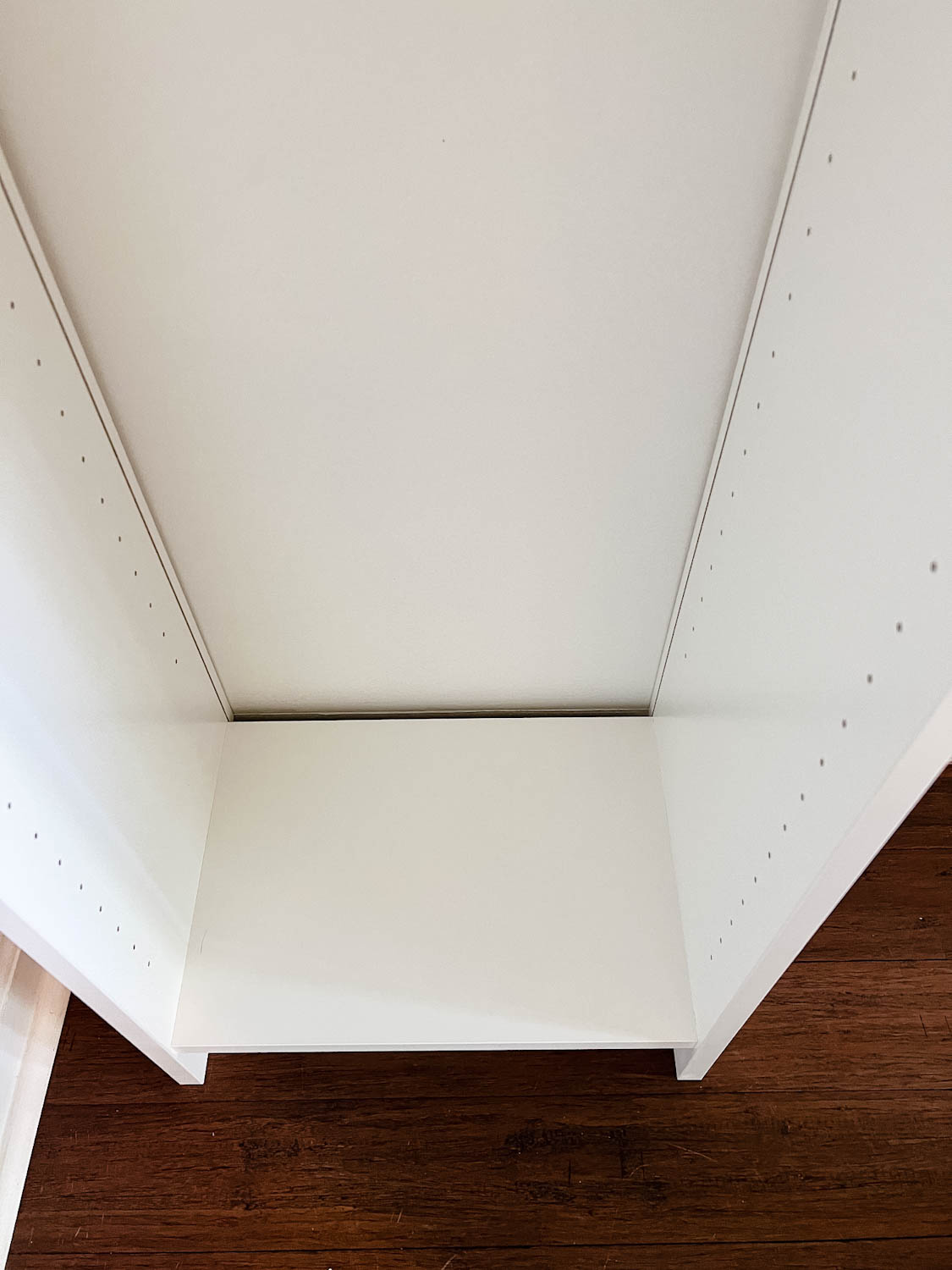 gap at the back of an IKEA Billy bookcase hack