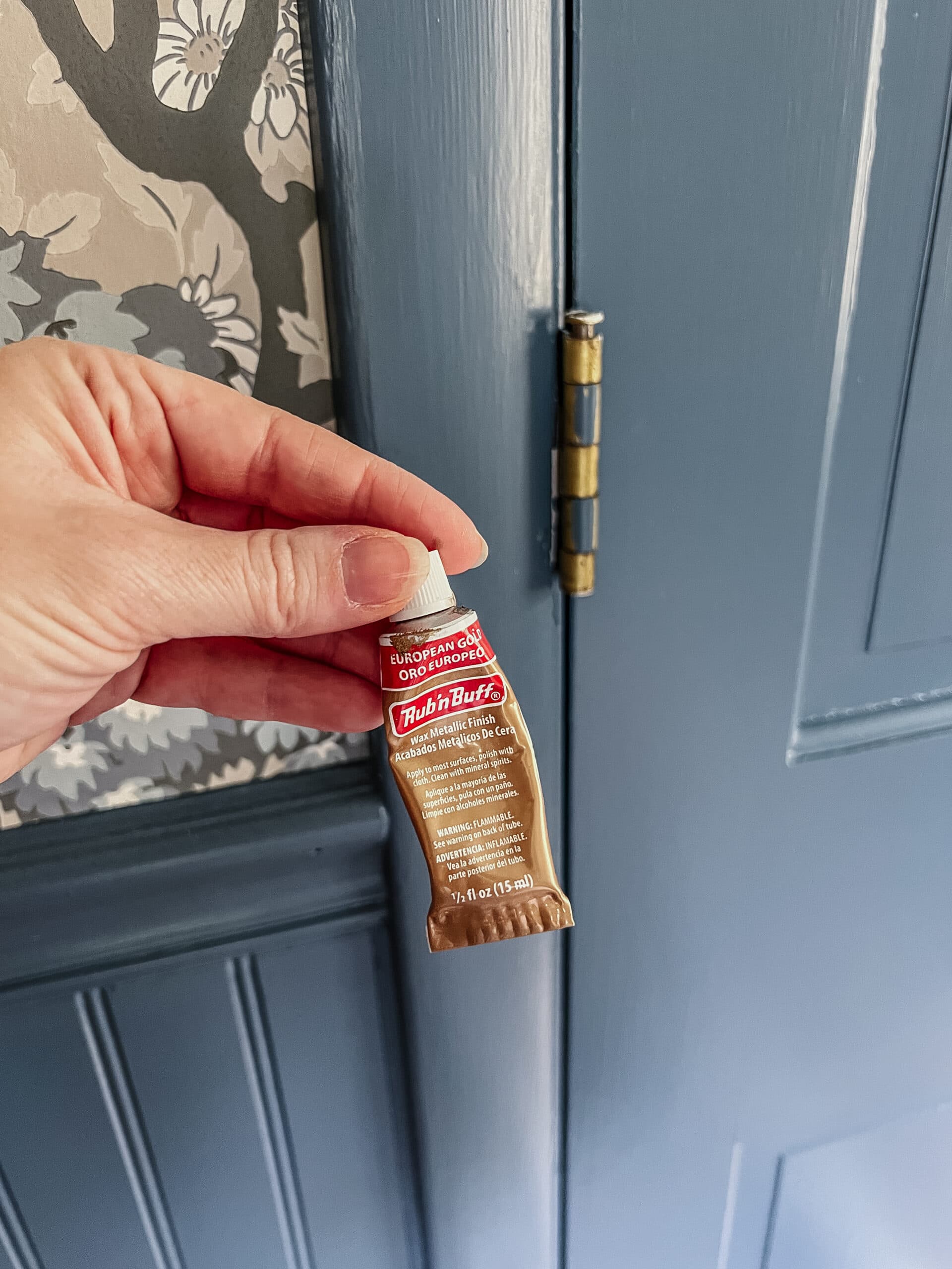 using Rub n Buff European Gold to brush on door hinges
