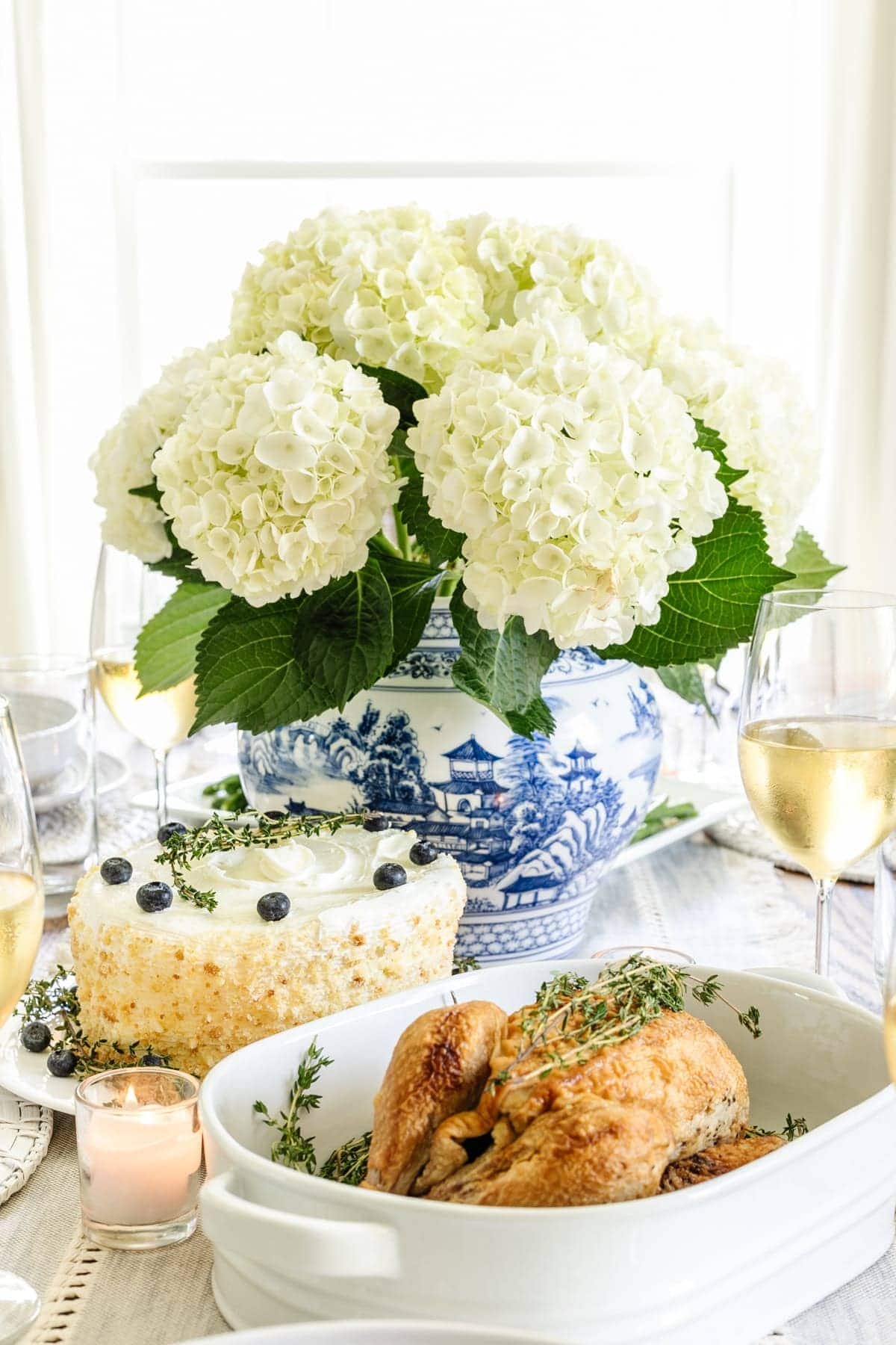 blue and white chinoiserie vase with hydrangeas for a classic interior design centerpiece