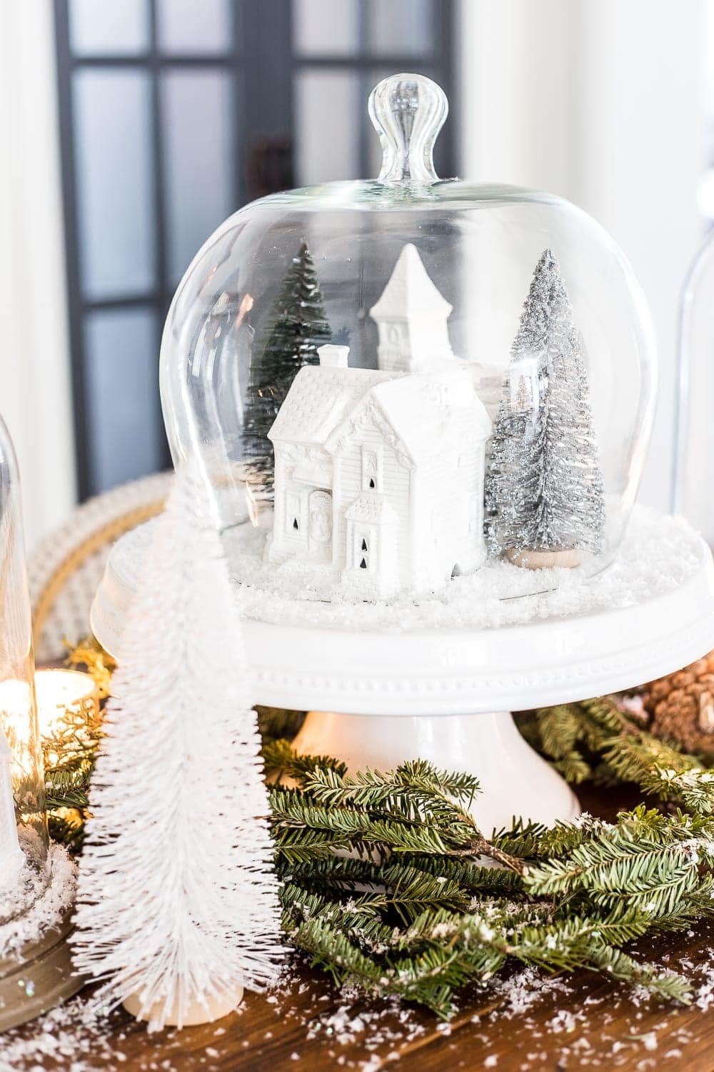 cheap Christmas decorations using spray paint to change the look of Christmas village figurines