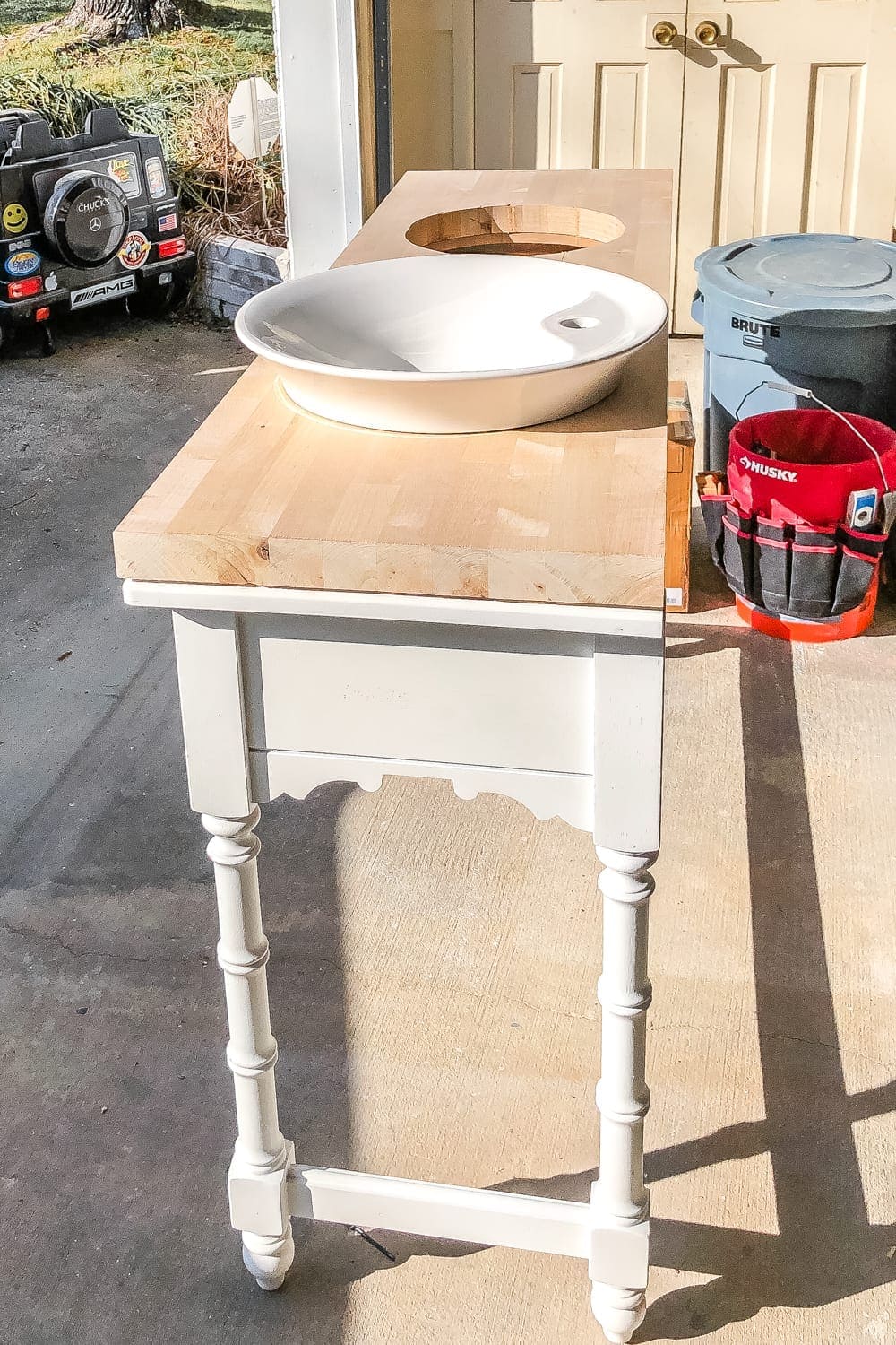 How to Turn a Console Table Into a Bathroom Vanity | blesserhouse.com - A tutorial for how to reconstruct a console table to repurpose as a bathroom vanity and leave drawers functional underneath sinks. 