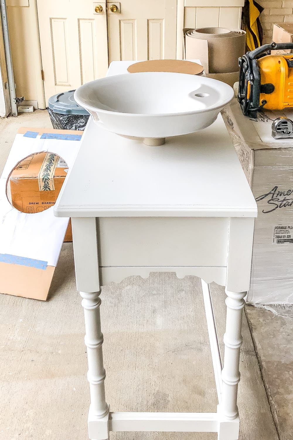 How to Turn a Console Table Into a Bathroom Vanity | blesserhouse.com - A tutorial for how to reconstruct a console table to repurpose as a bathroom vanity and leave drawers functional underneath sinks. 