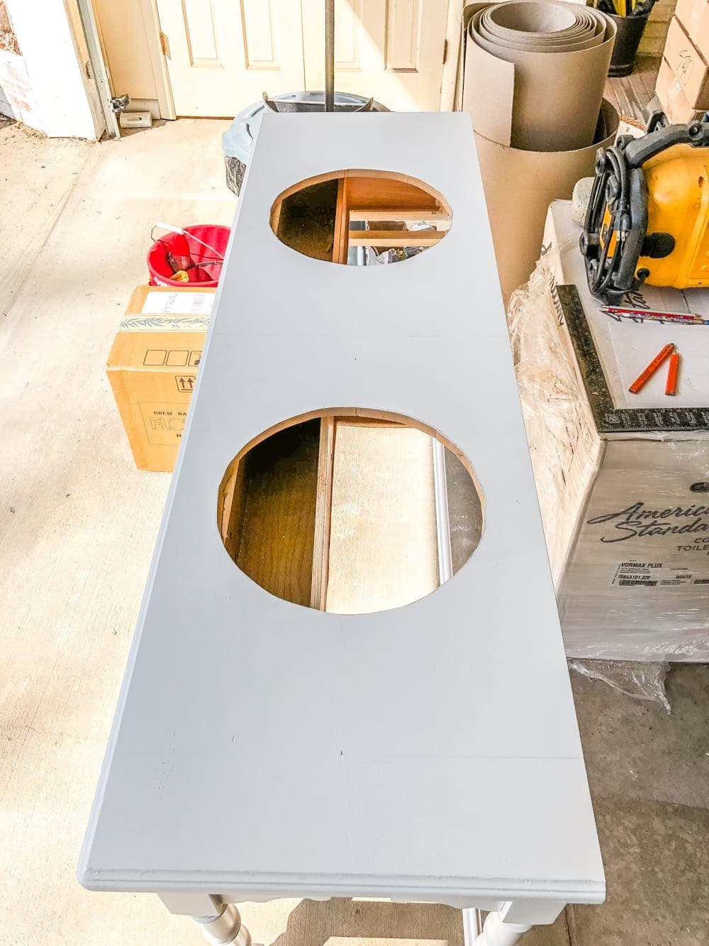 How to Turn a Console Table Into a Bathroom Vanity | blesserhouse.com - A tutorial for how to reconstruct a console table to repurpose as a bathroom vanity and leave drawers functional underneath sinks. 