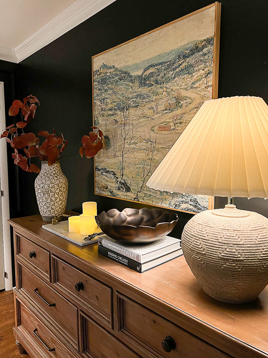 fall branches in vase, flameless candles, and table lamp dresser decor