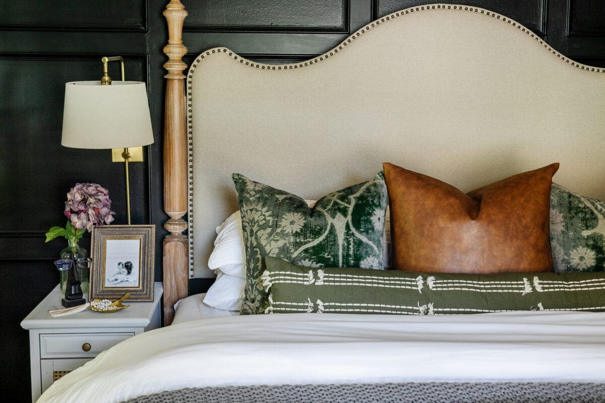 add down pillow inserts to throw pillow covers on a bed