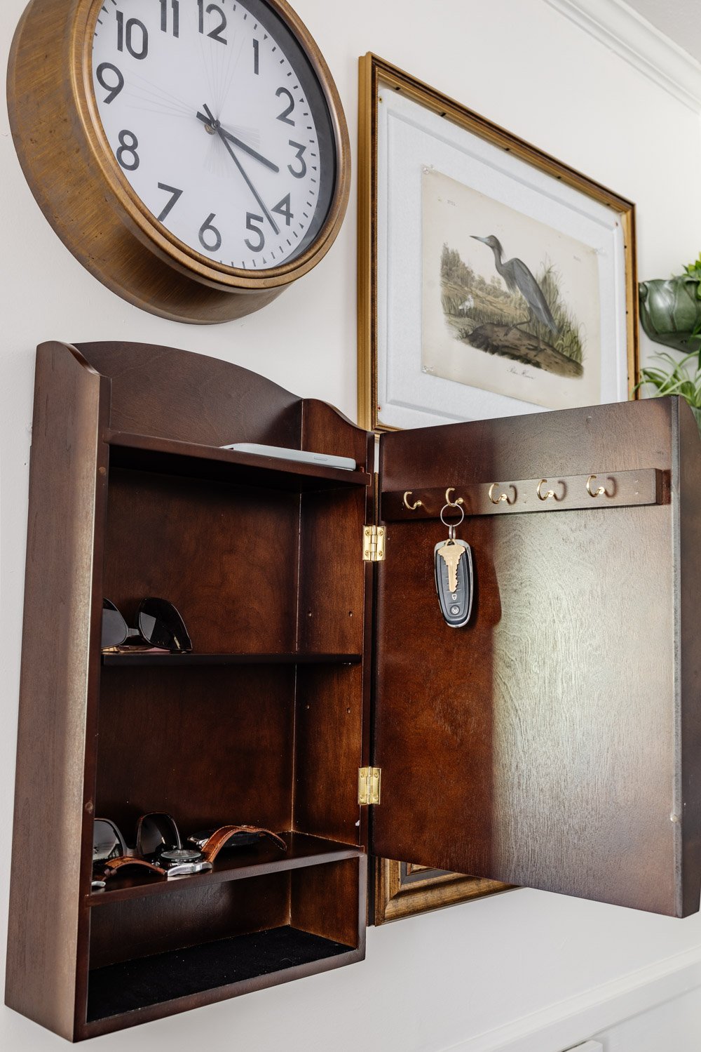 key rack and mail sorter cabinet on family command center wall