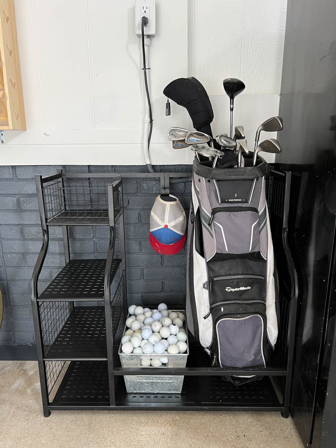 golf storage rack against a wall