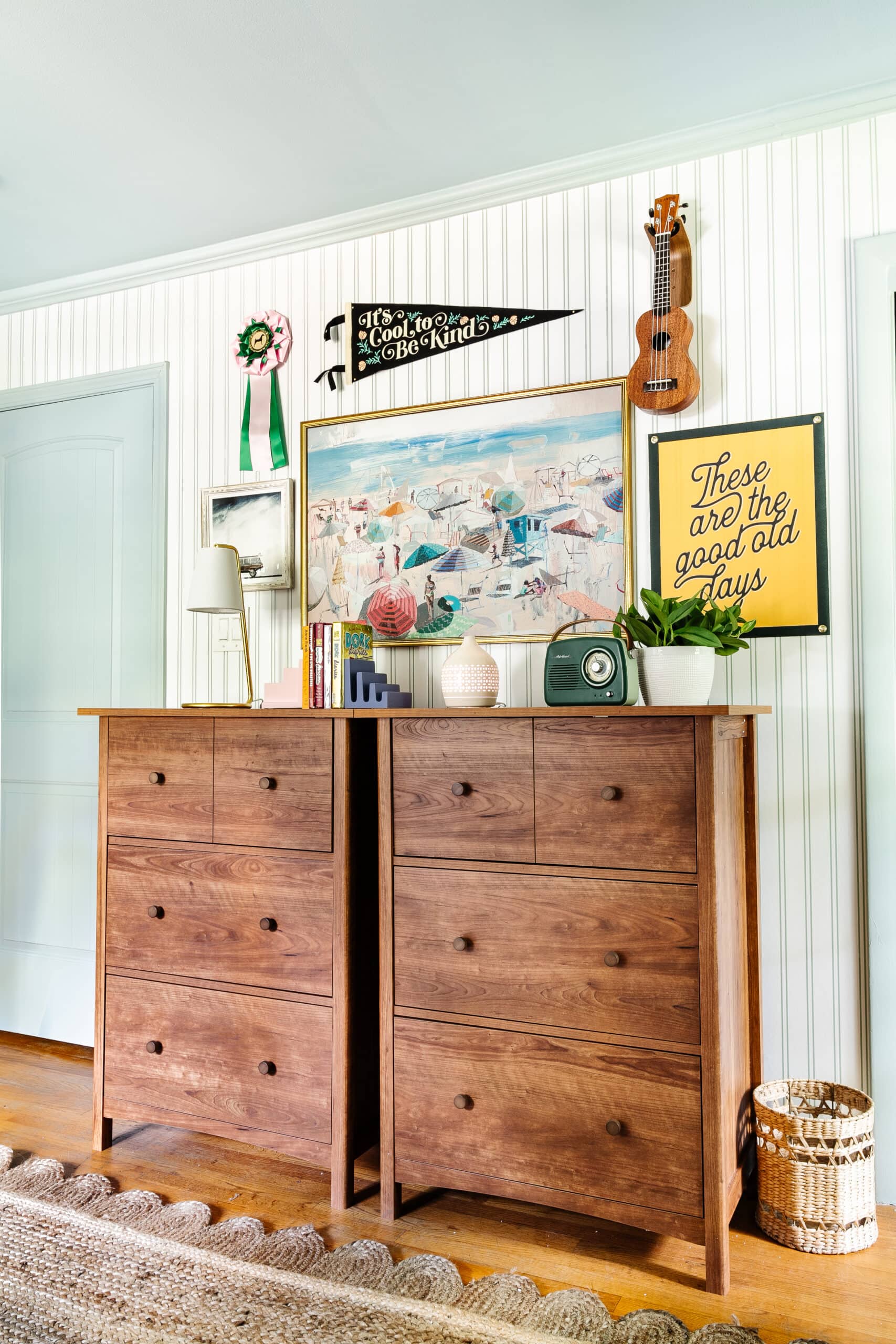 kids gallery wall above a dresser