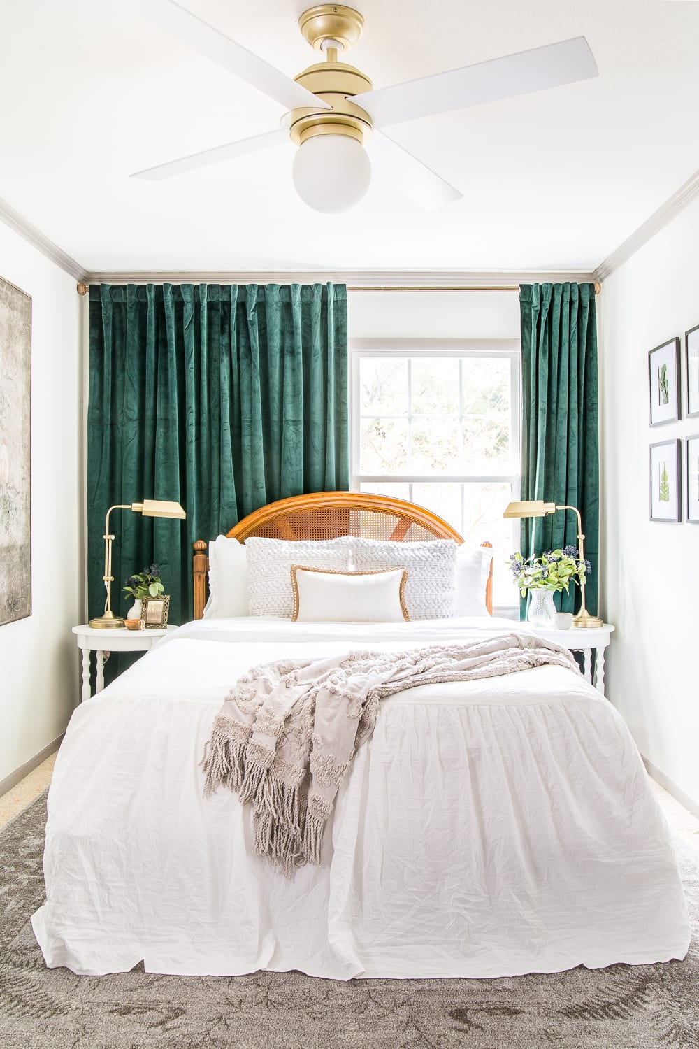 faux velvet Amazon bedroom curtains in green from Half Price Drapes on window behind headboard
