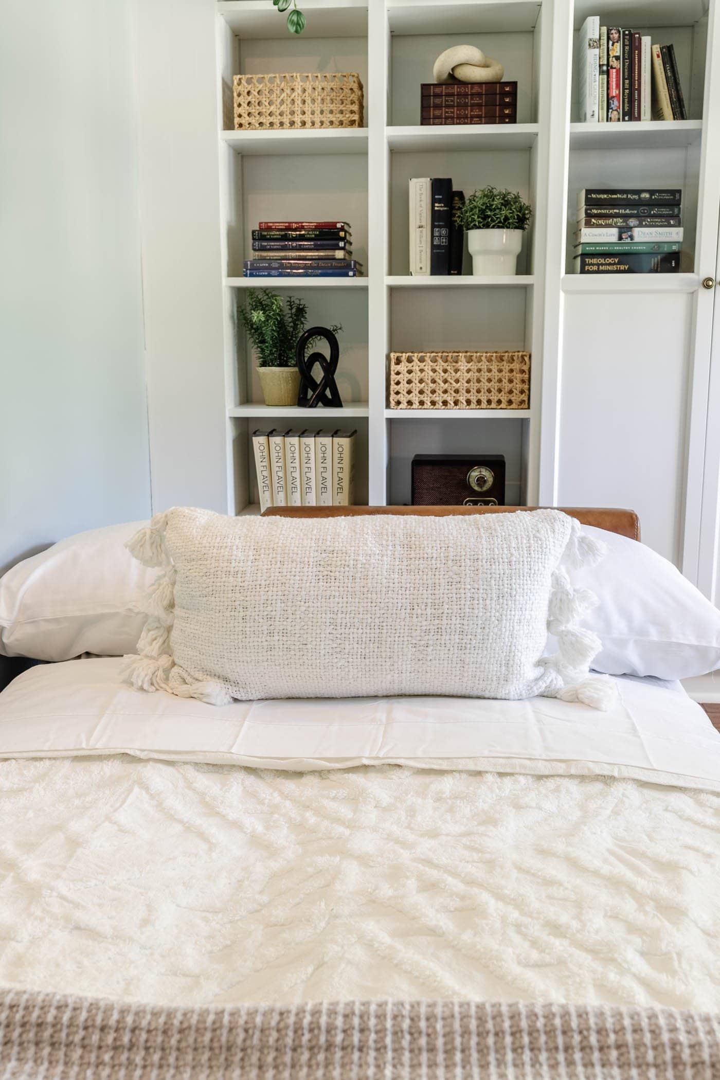 guest bedding on a futon in an office