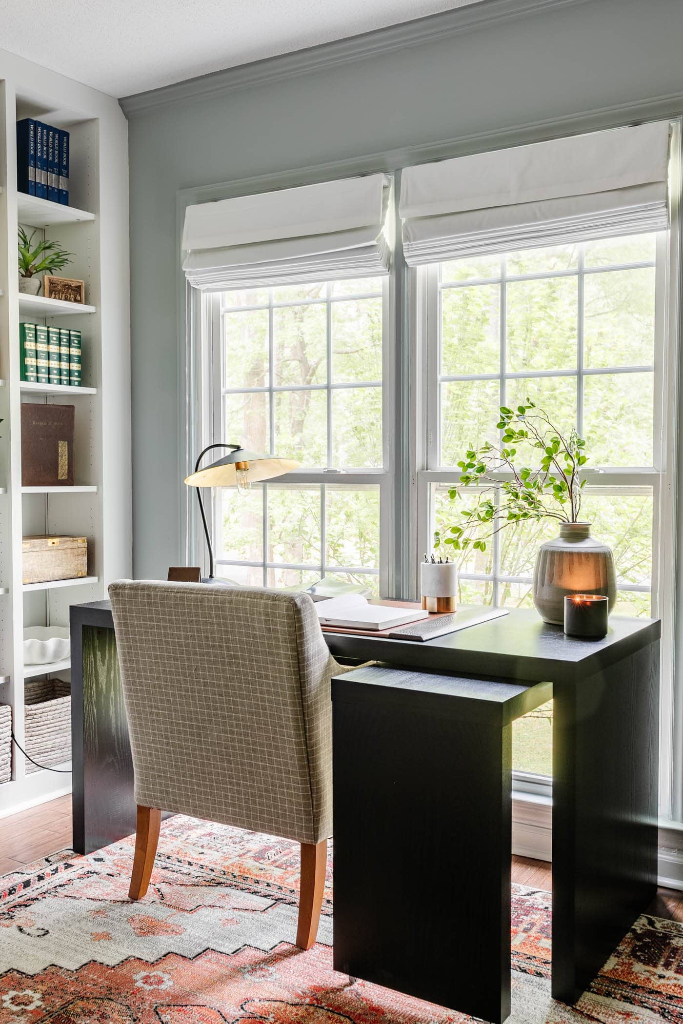 home office desk looking out of window with clean lines for a classic interior design