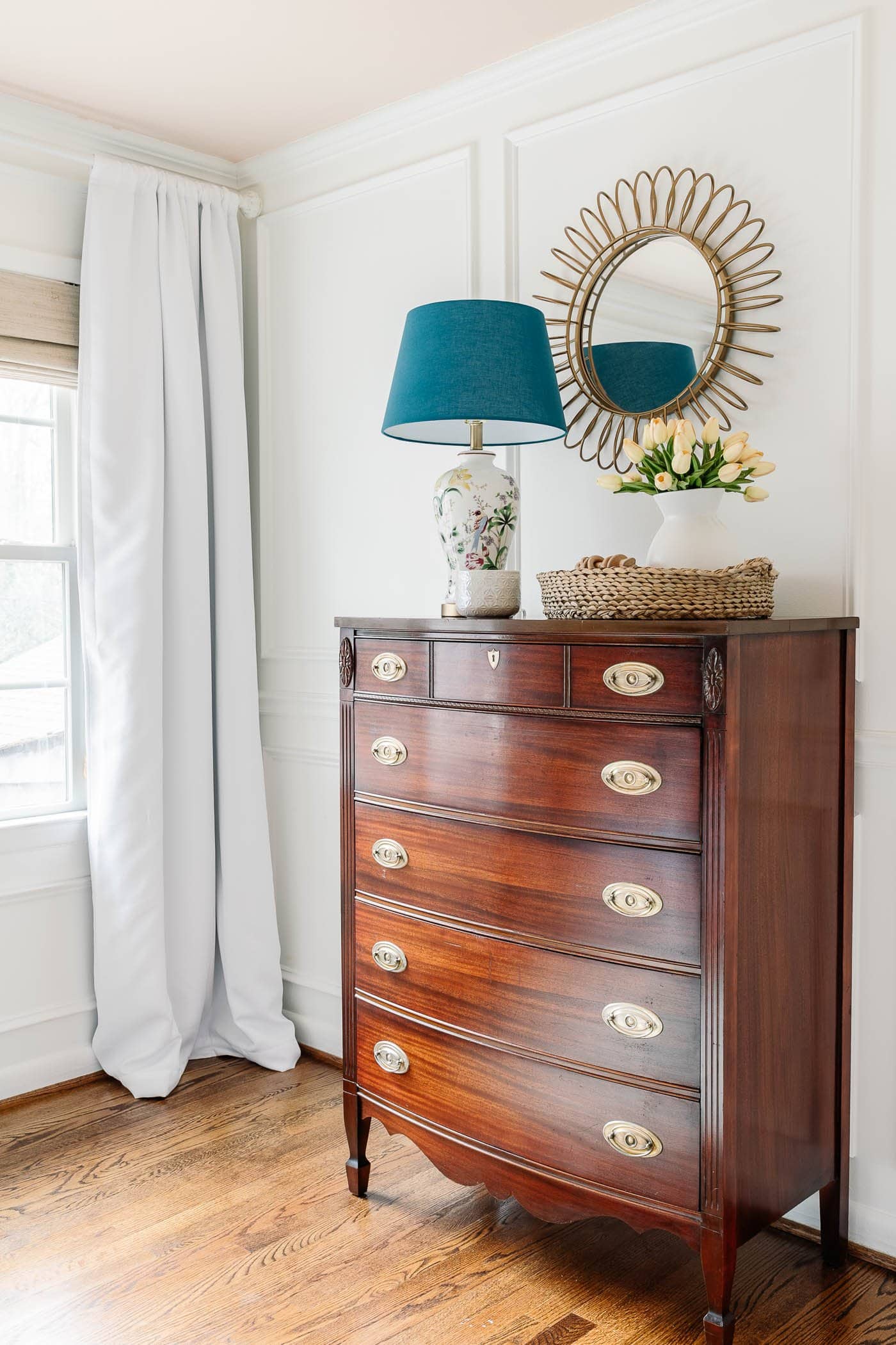 wood dresser in a toddler girl bedroom