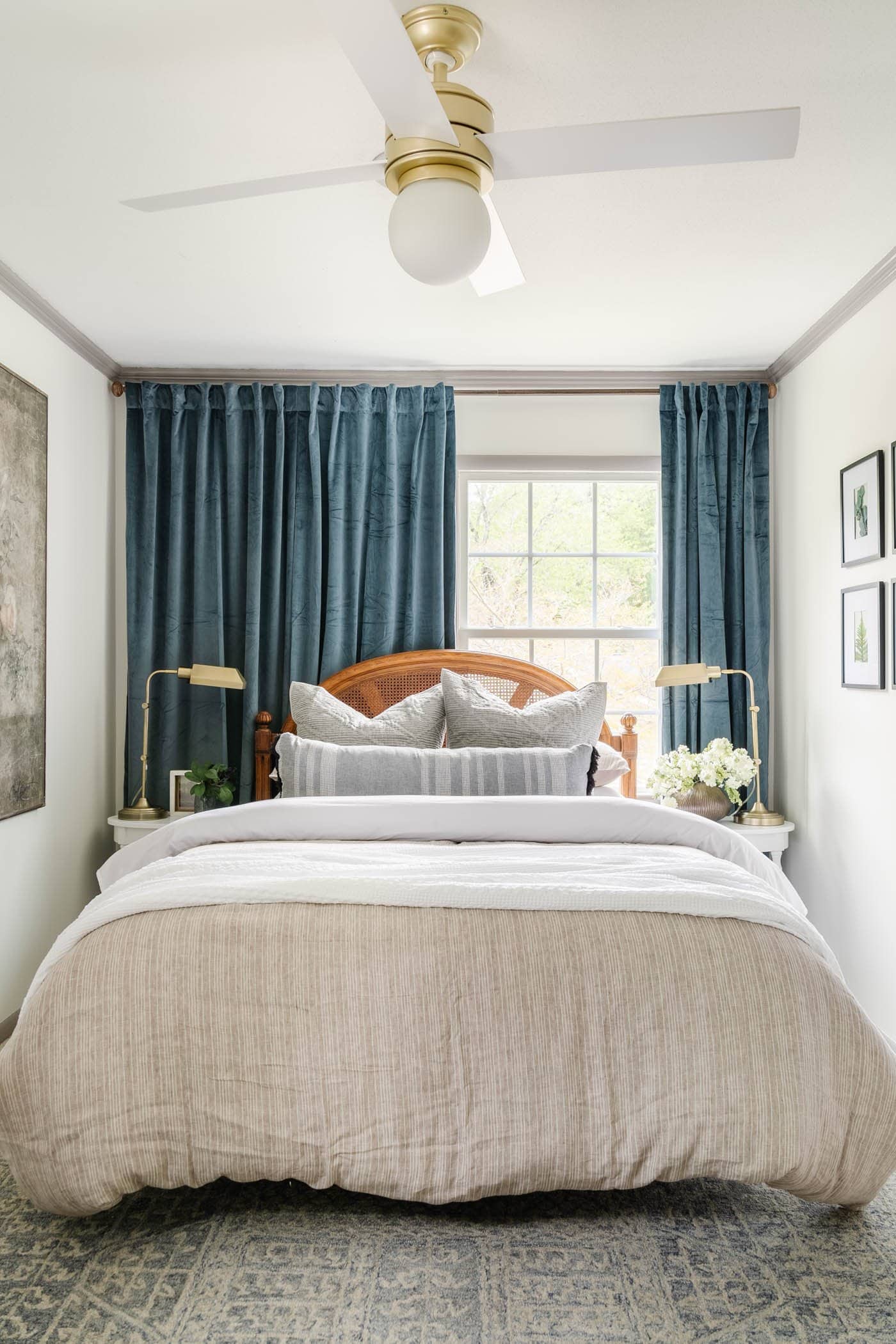 faux velvet Amazon bedroom curtains in blue from Half Price Drapes on window behind headboard