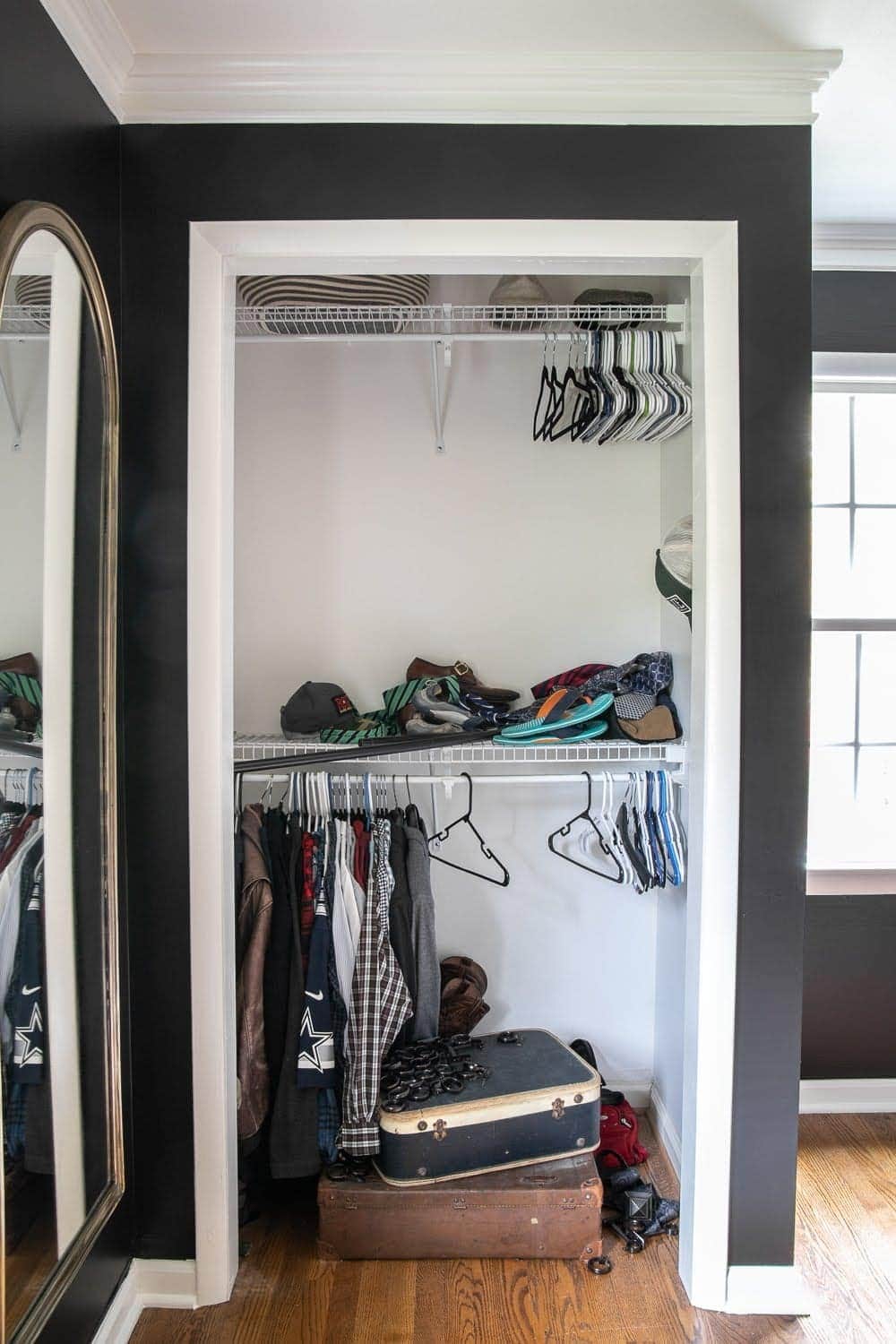 5 rules about primer and paint we wish we had known as beginner DIYers and how to create a paint finish on walls, doors, trim, and moldings that last. | Master Bedroom Refresh using black paint with Kilz®