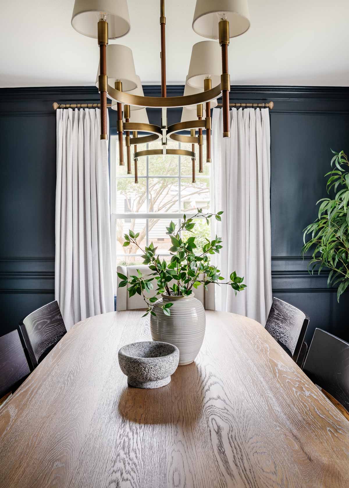 how to make your house look expensive - hang curtains high and wide