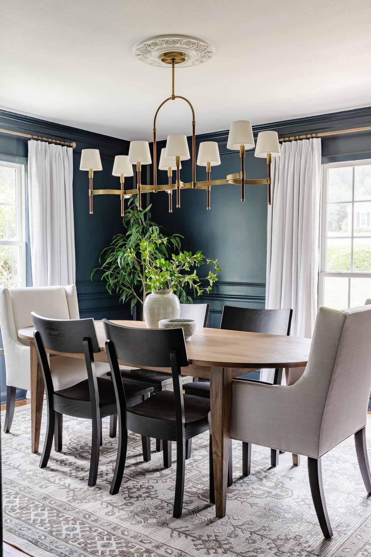 dining room painted navy blue Romabio Blue Ridge Parkway with two windows in natural light