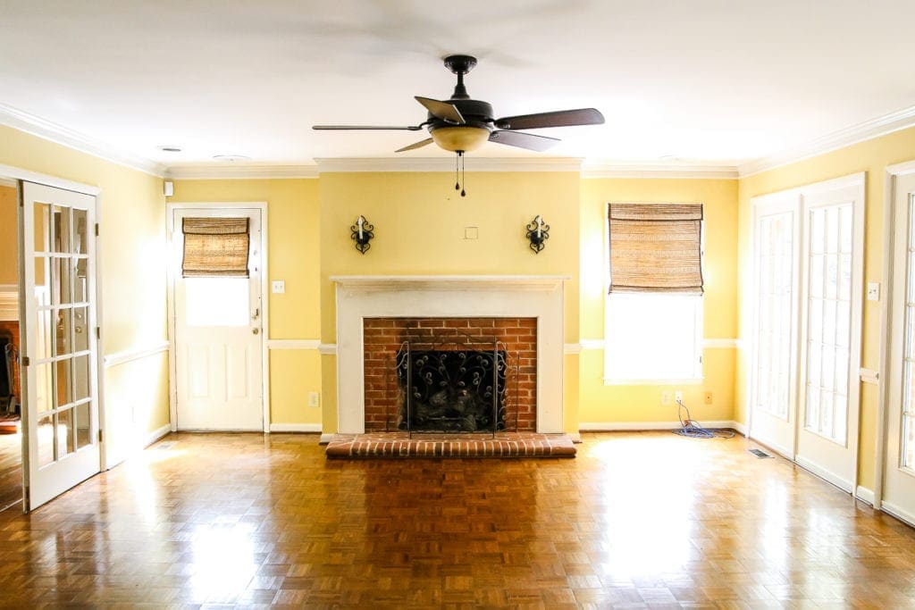 living room before with yellow paint