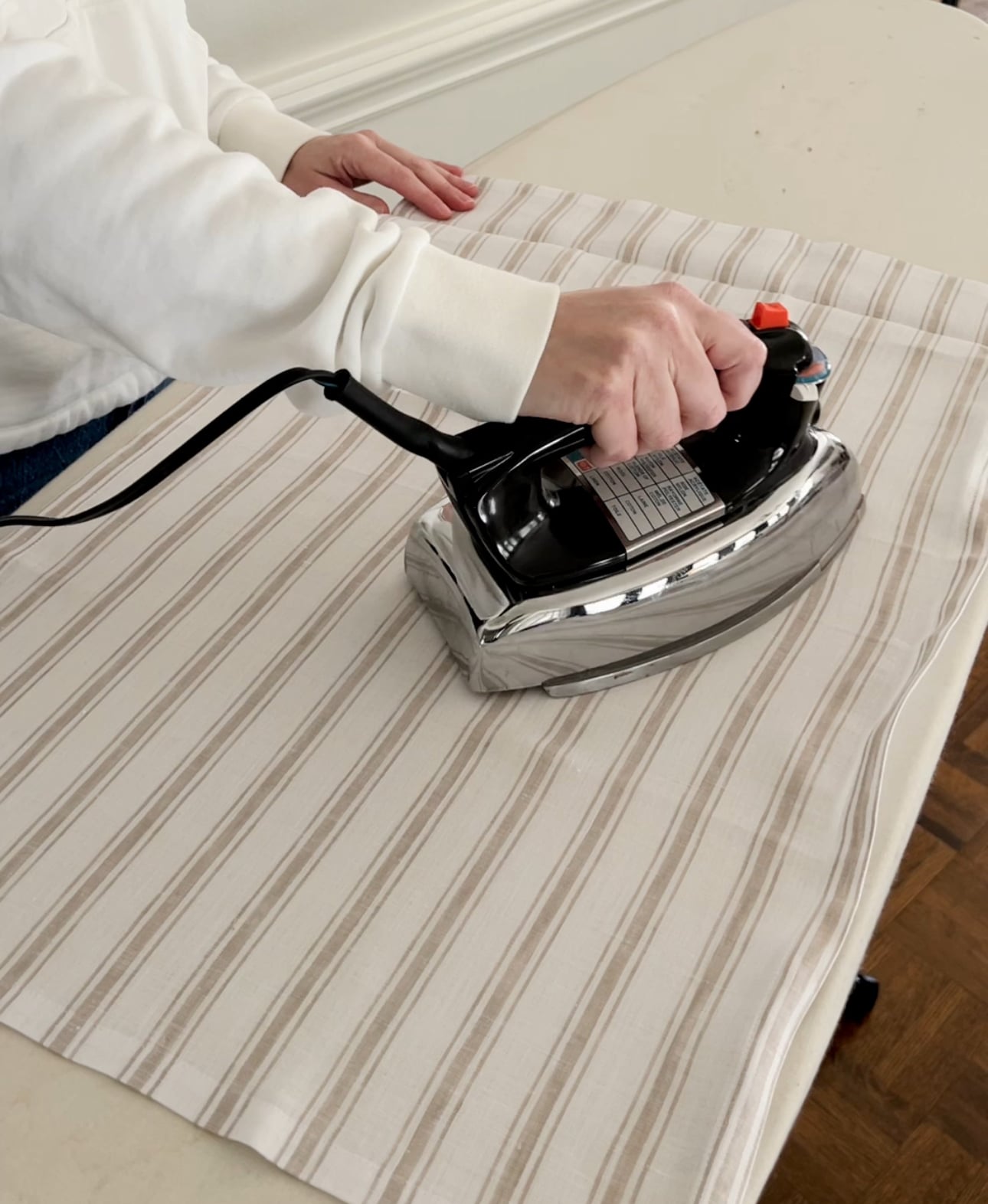 hot iron on a linen kitchen towel