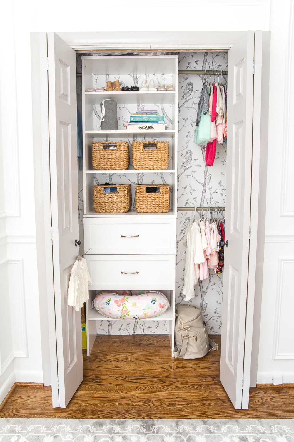 Nursery Organization | Baby closet with shelving, baskets, and closest dividers to make it easy to find everything.