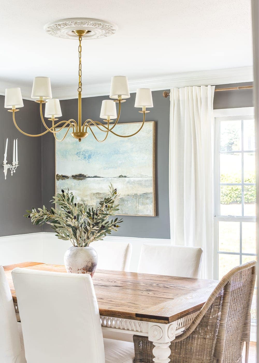 using oversized art as a large wall decor idea to make a room feel bigger