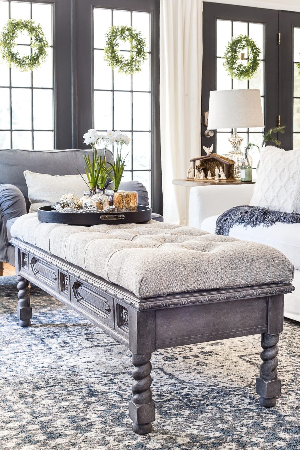 ottoman made from a coffee table from the thrift store