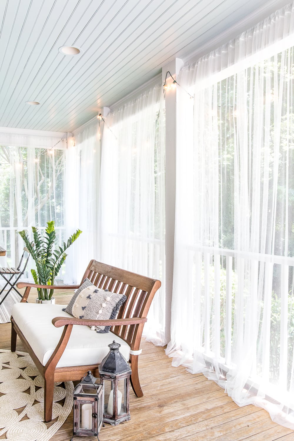 mosquito net curtains around back porch