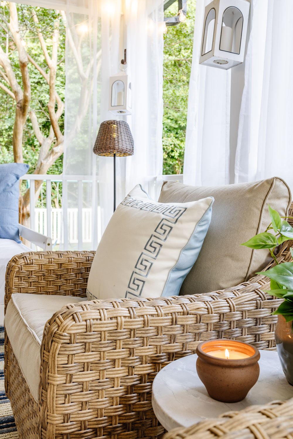 outdoor living room with fireplace on a back porch