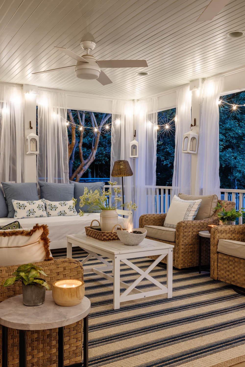 outdoor living room with fireplace on a back porch