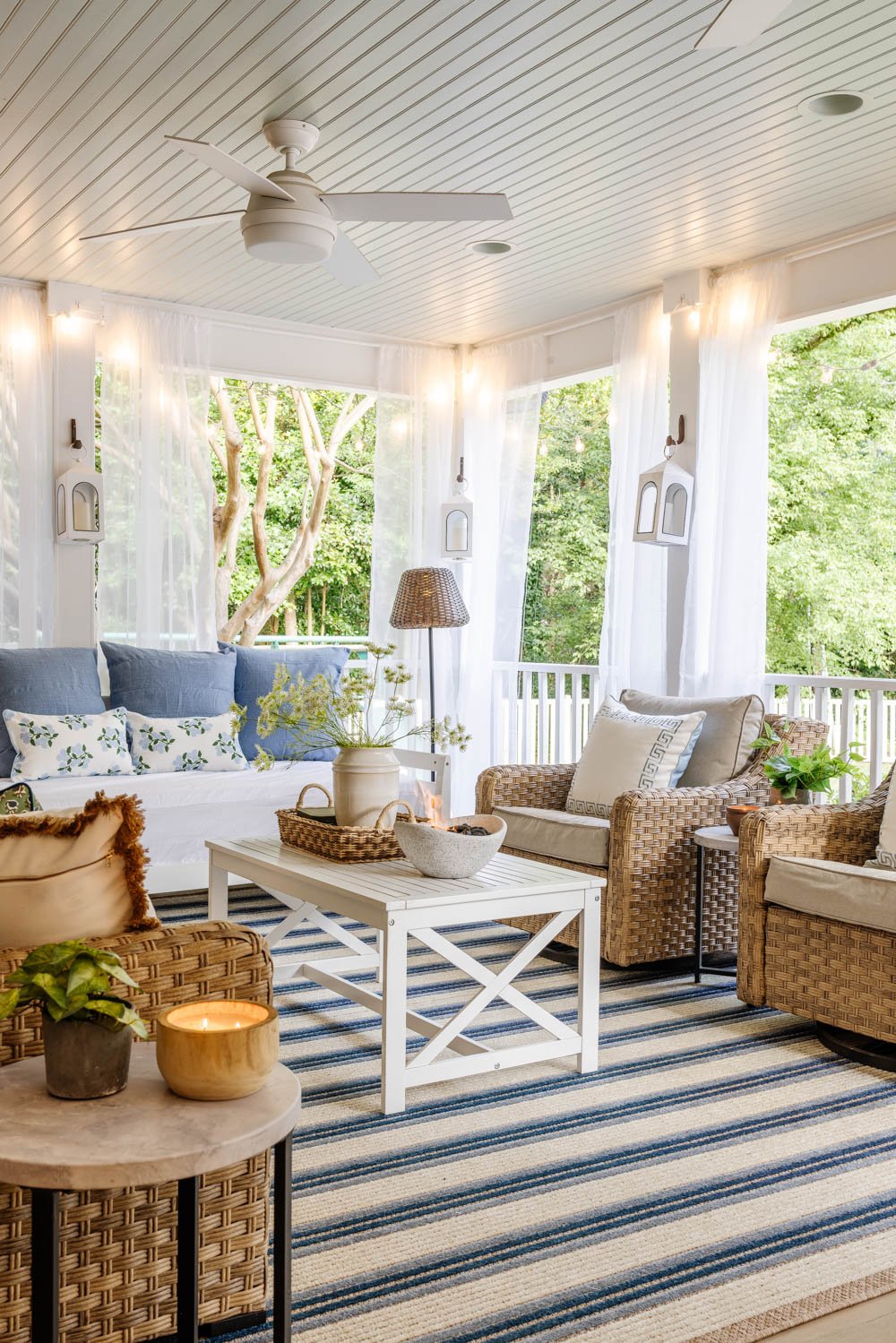 outdoor living room with fireplace on a back porch
