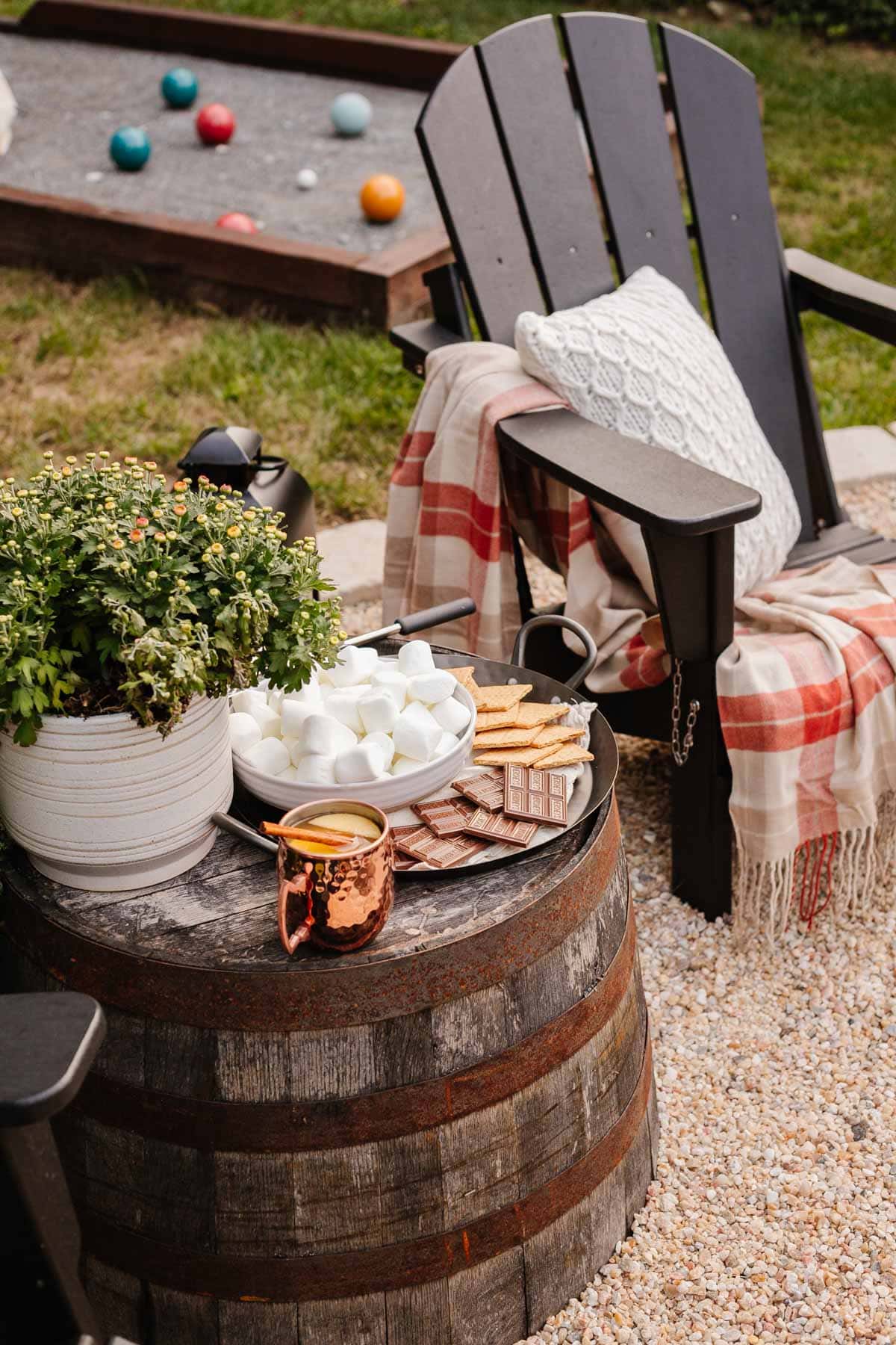 upside down planter used as an outdoor side table