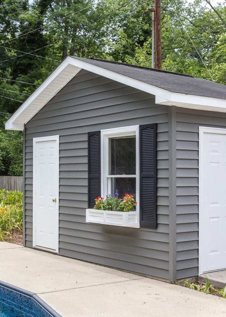 painted vinyl siding on a backyard shed
