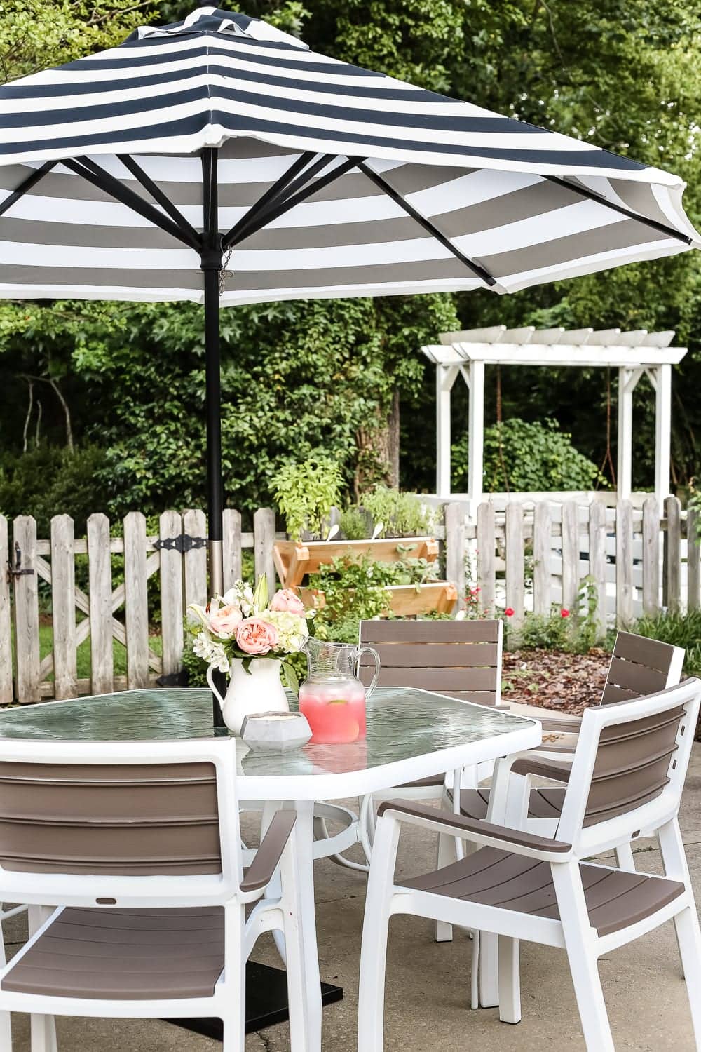 glass patio table and umbrella