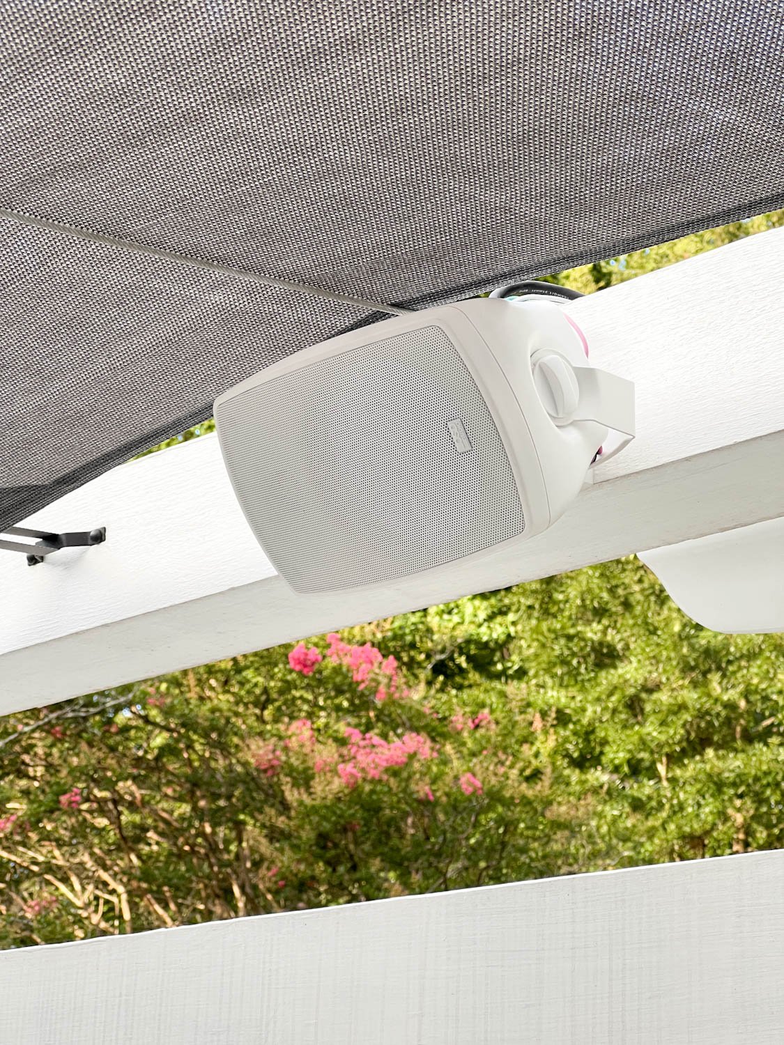 outdoor speakers on a pergola