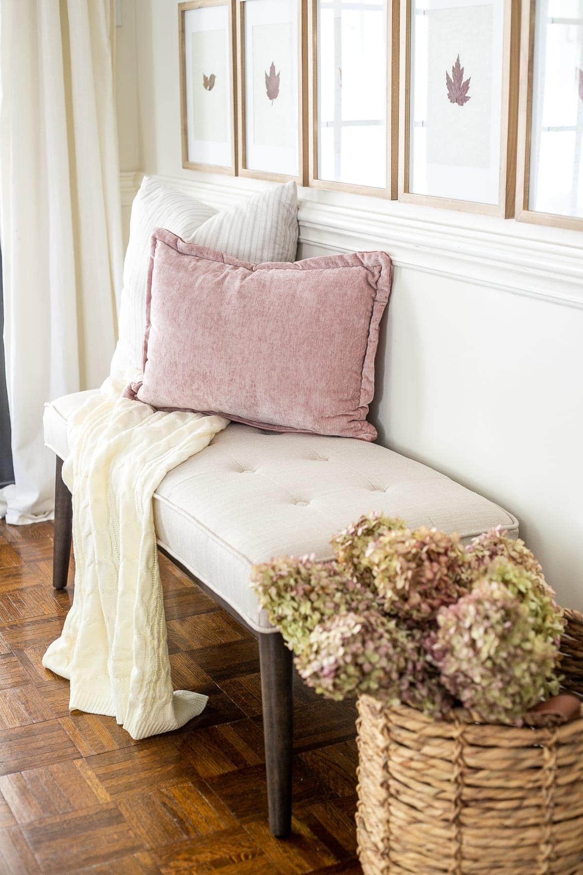 dried hydrangeas entryway bench and blush pillow