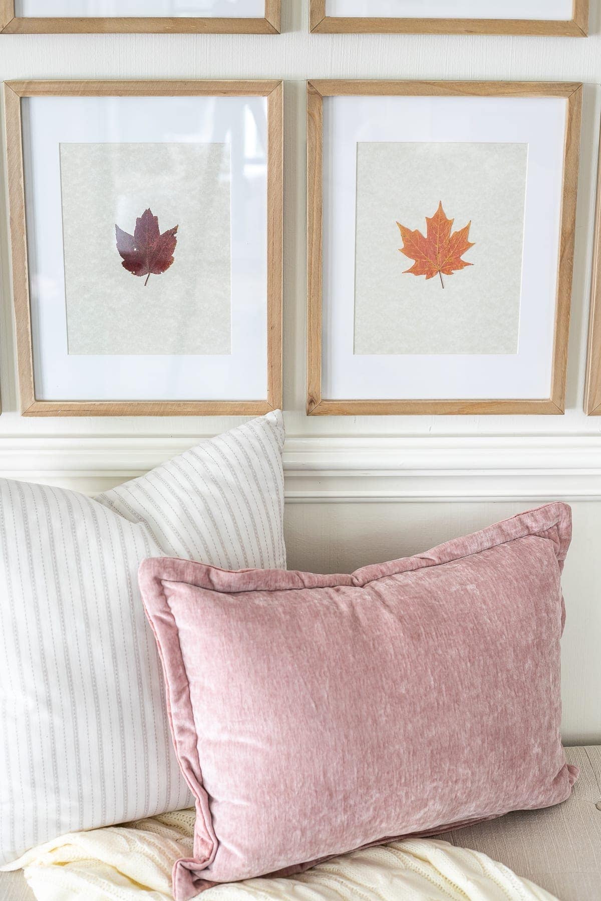 pressed fall leaves framed and neutral and blush throw pillows
