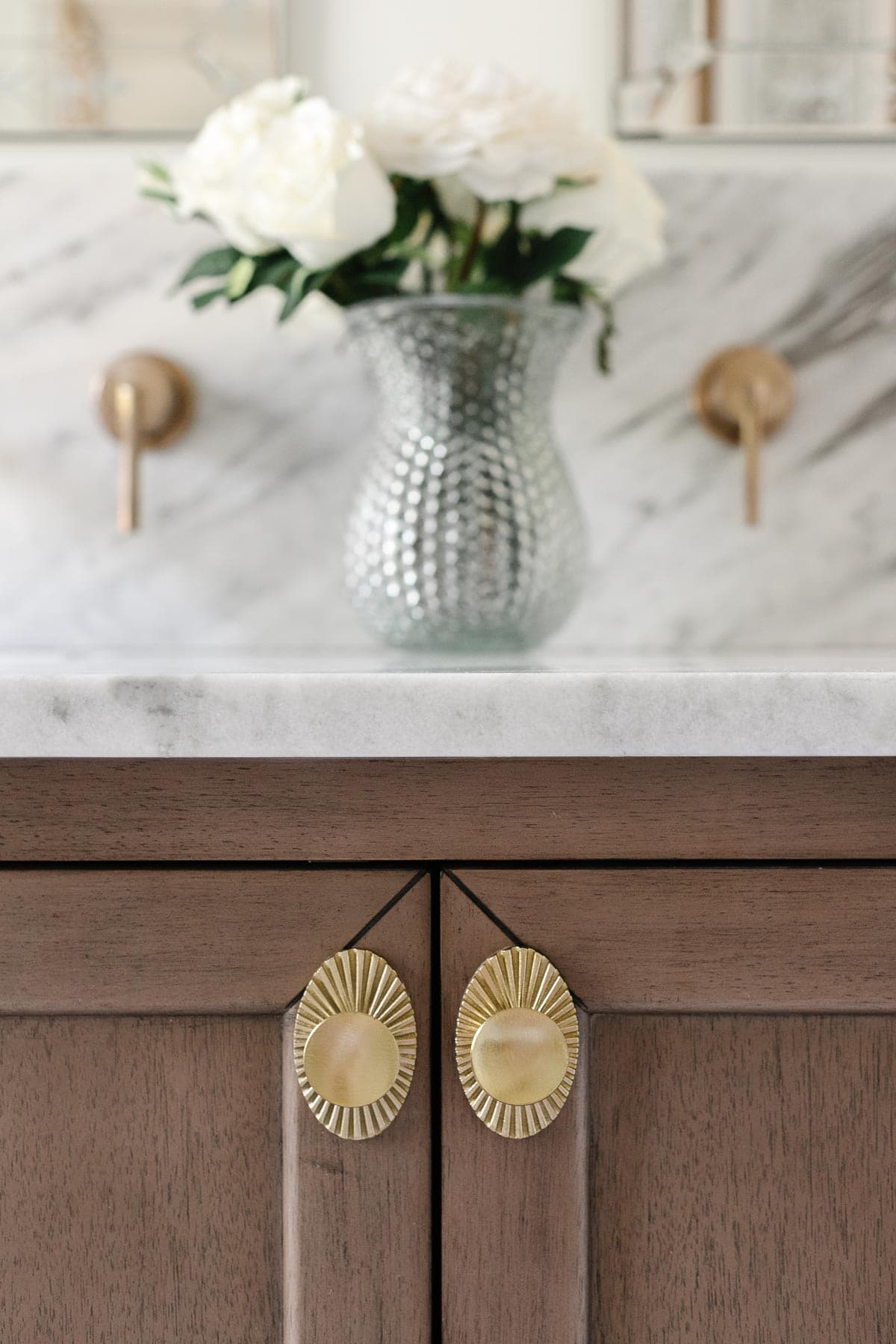 how to make your house look expensive - swap out hardware on cabinets