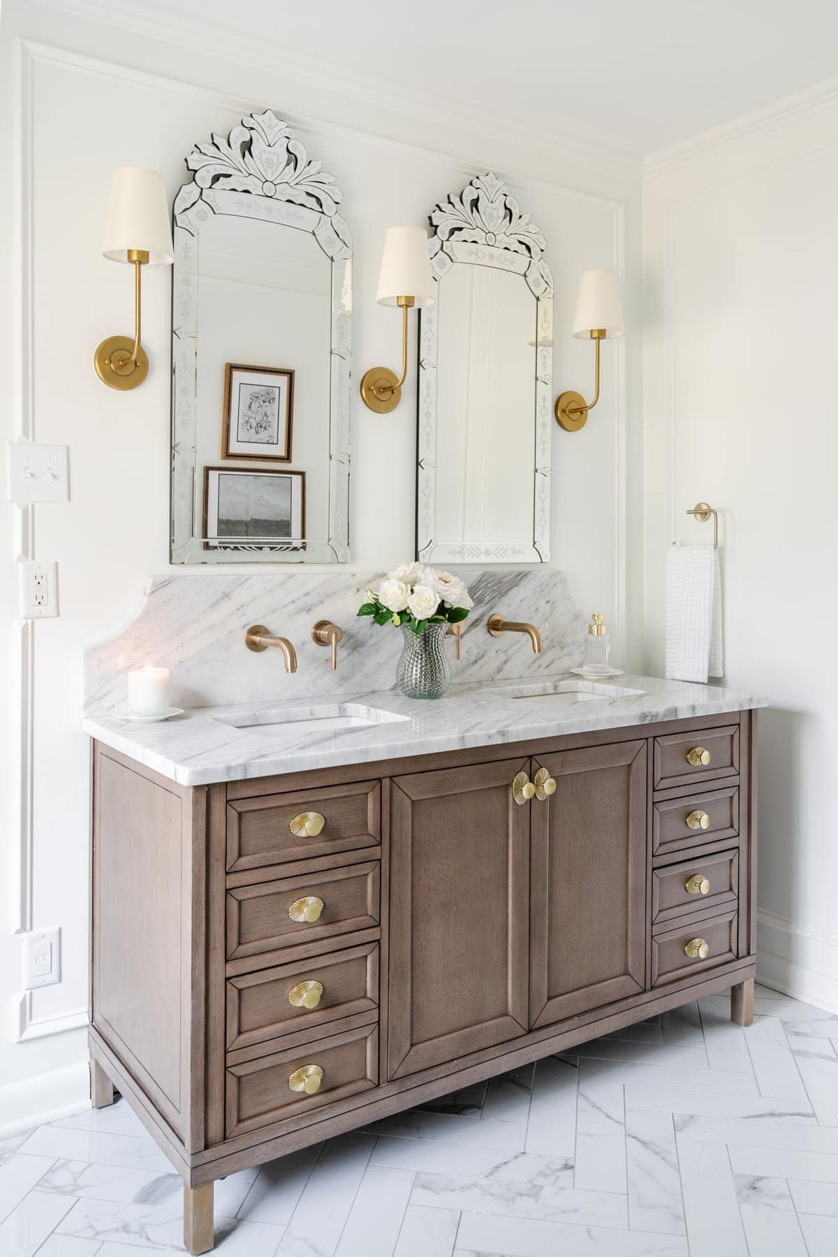 French inspired master bathroom remodel with marble countertop and herringbone tile painted Benjamin Moore Chantilly Lace