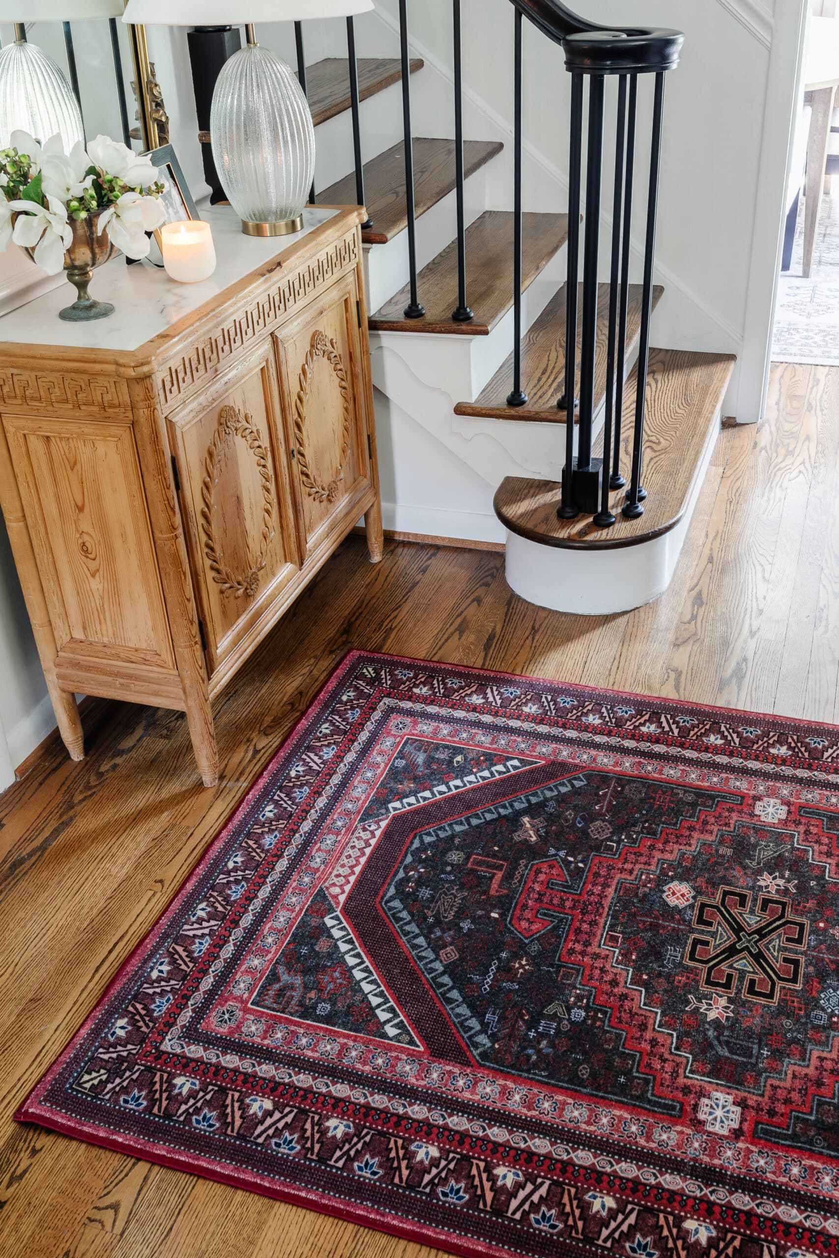 red ruggable rug at the bottom of stairs