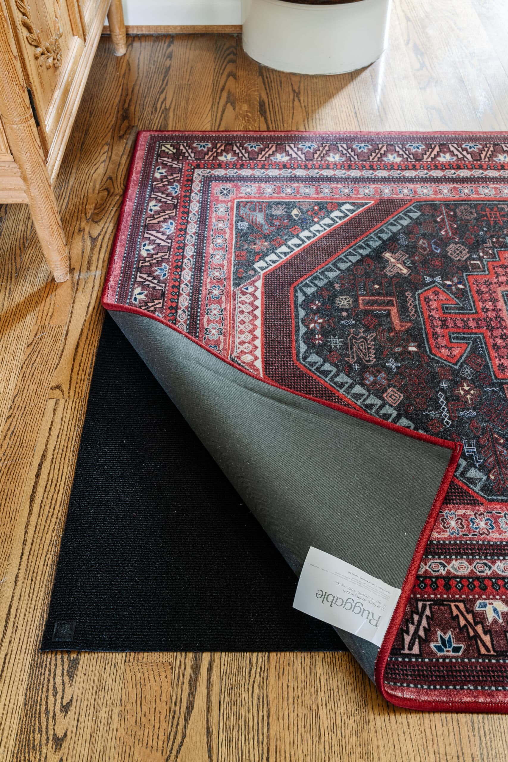 new design reinforced rug pad corner to prevent curling on ruggable rug